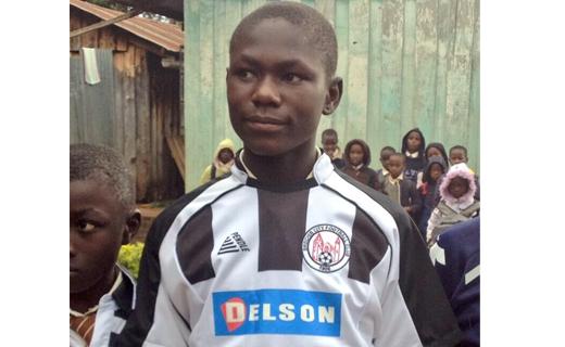 A Litein High School Pupil wearing a Brechin City FC top.