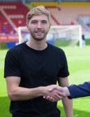 Euan Smith signs